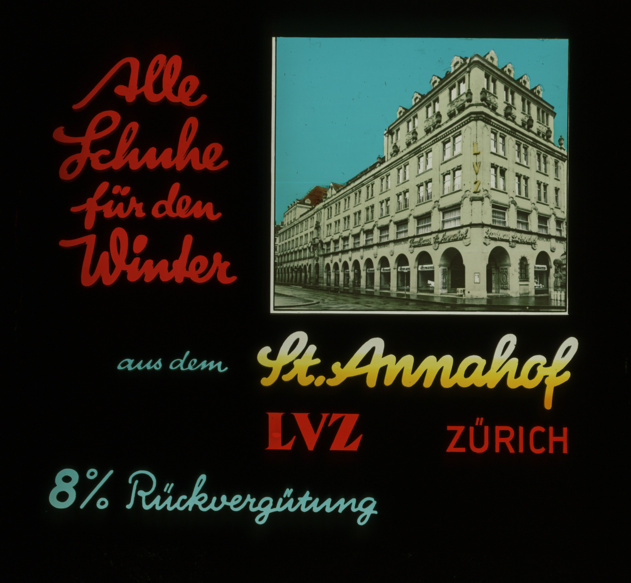 Dia: Aussenansicht St. Annahof, dazu Text: "Alle Schuhe für den Winter aus dem St. Annahof LVZ Zürich / 8% Rückvergütung".